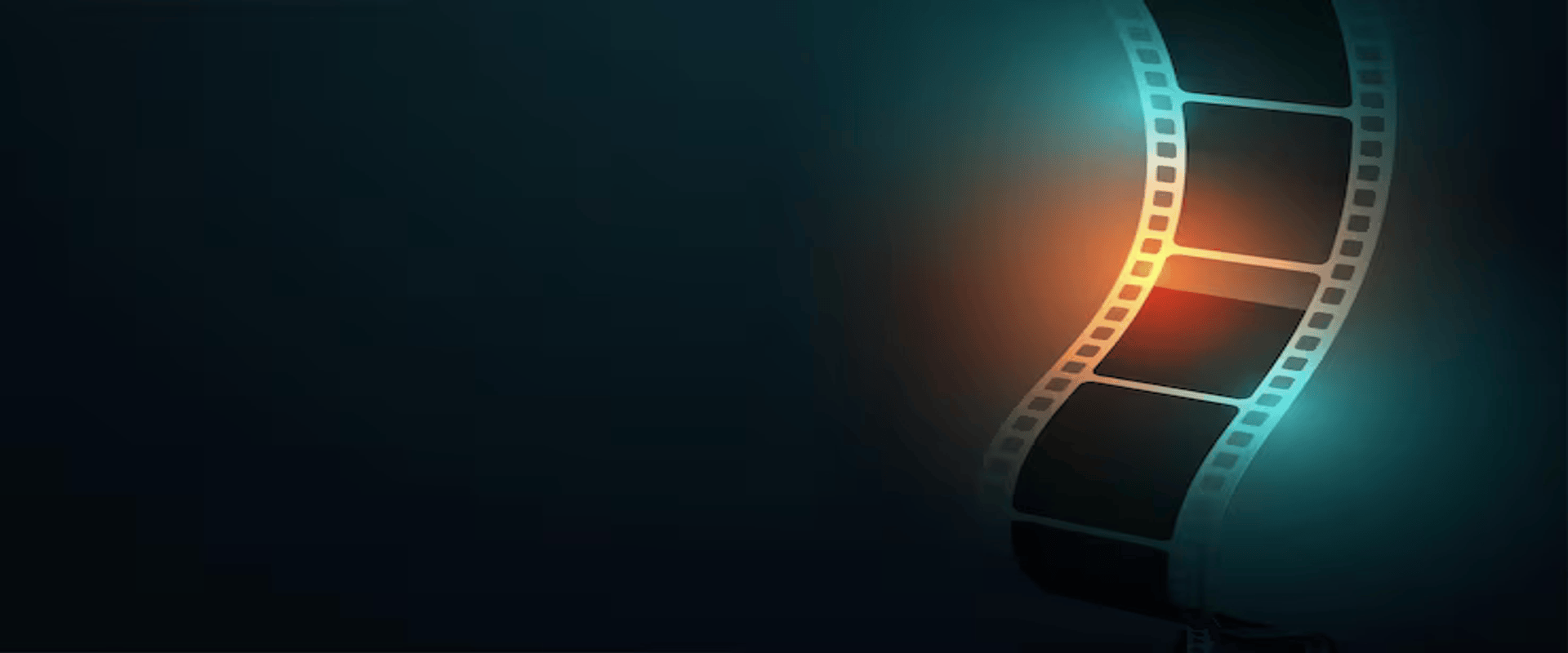 Film editor working at editing suite in dark cinema post-production environment